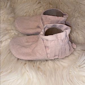 Handmade baby moccasins in soft pink